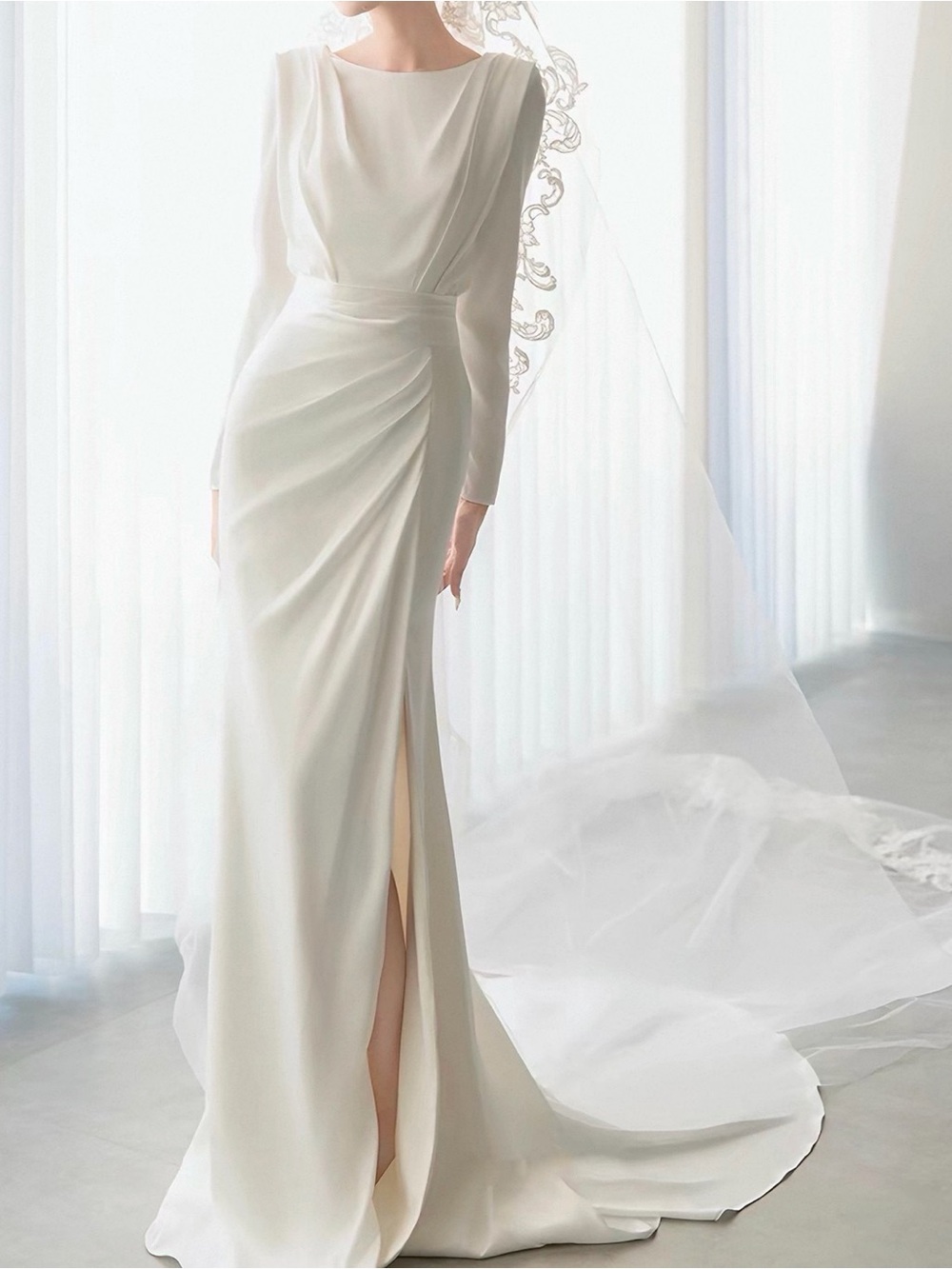 Elegant Long-Sleeve White Bridal Gown with Side Drape and Slit